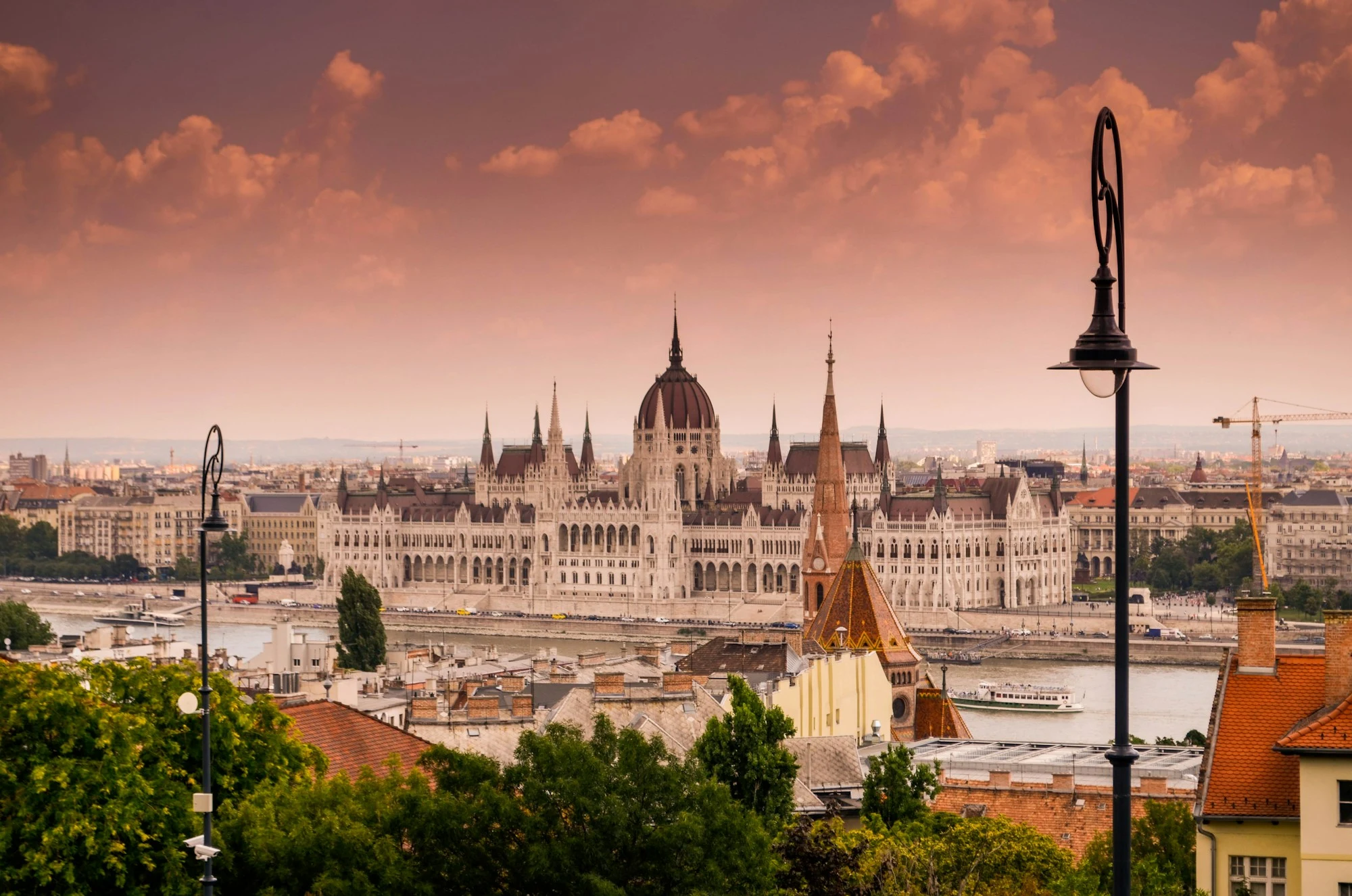 Budapest's illuminated riverfront and the Hungarian Parliament viewed across the Danube