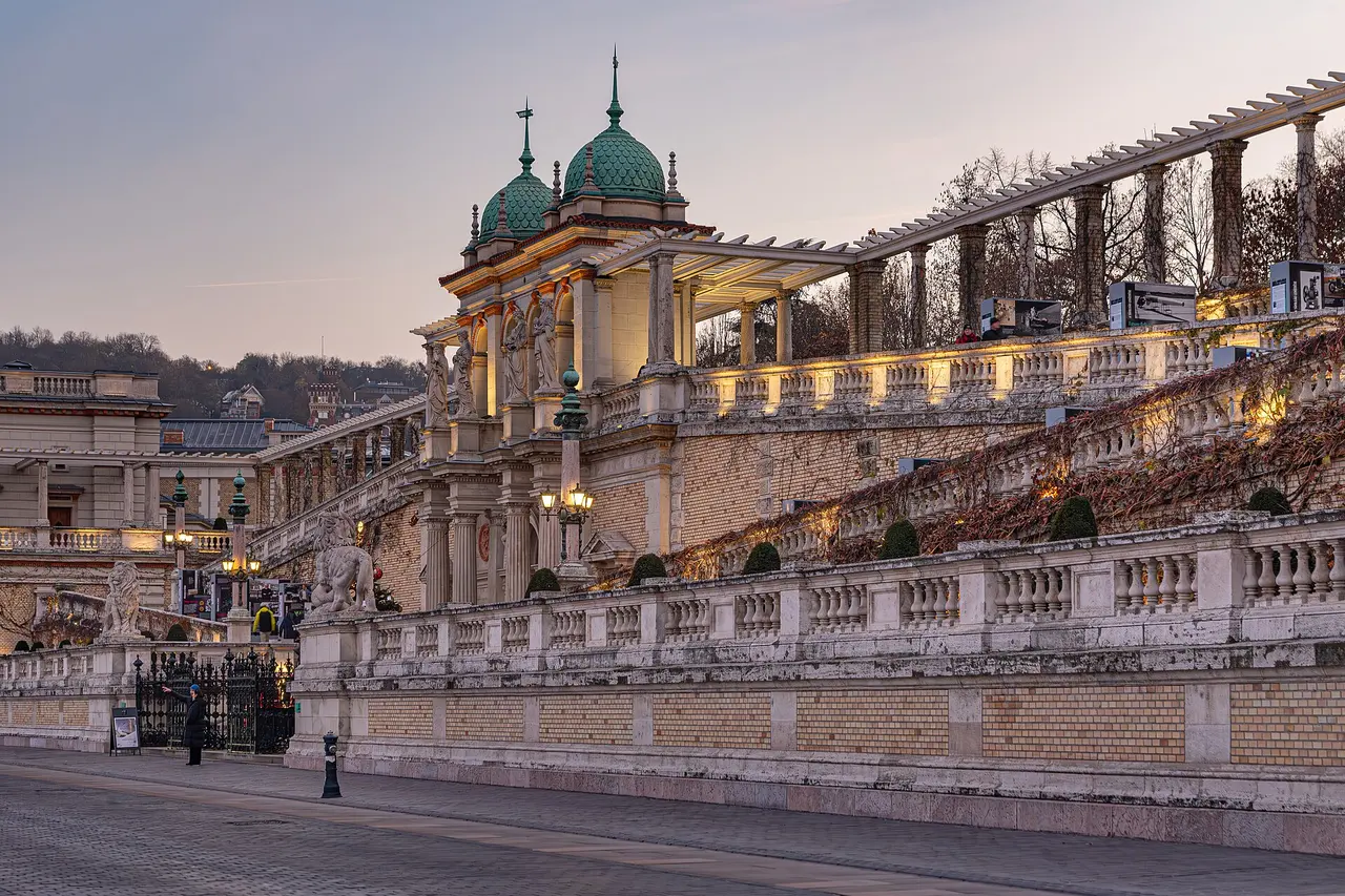 The domed pavilions and terraces of the Castle Garden Bazaar below Buda Castle at dusk
