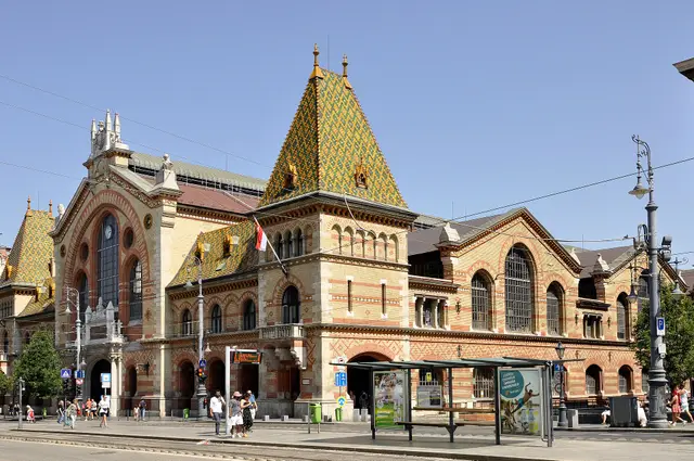 The red-brick facade and tiled roof of the Great Market Hall