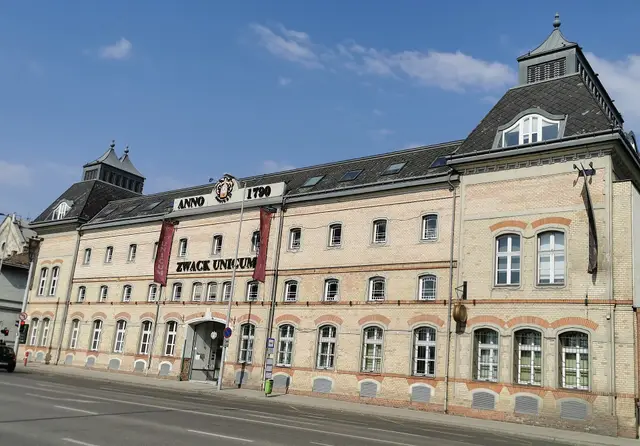 The long historic Zwack Unicum factory building, home of the House of Unicum