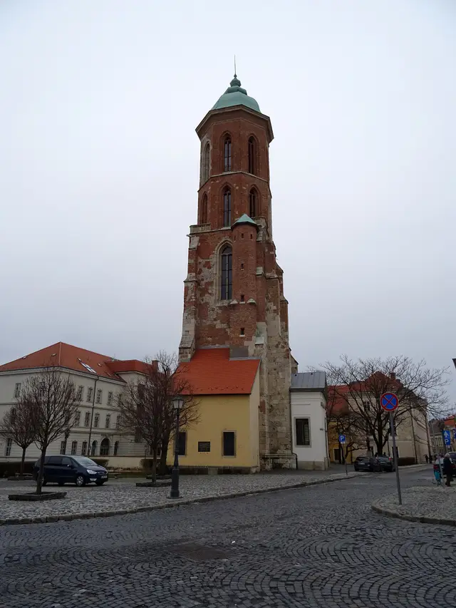 The red-brick Mary Magdalene Tower rising above Castle District rooftops