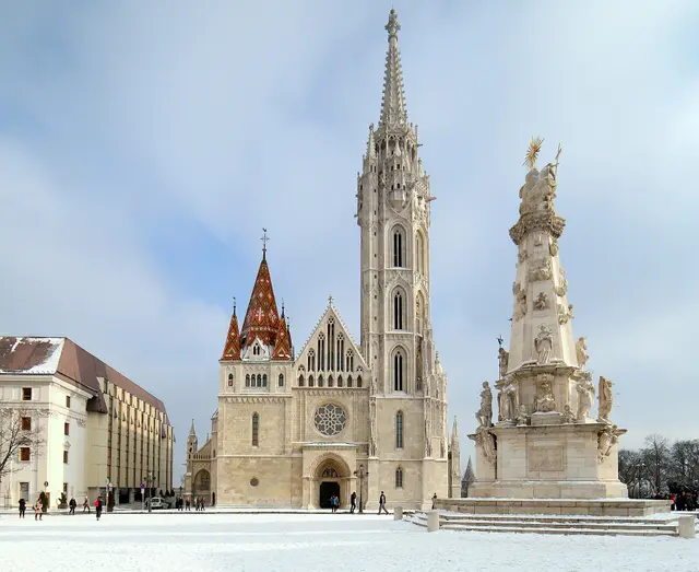 Matthias Church with its tall Gothic spire and the Holy Trinity Column on Trinity Square
